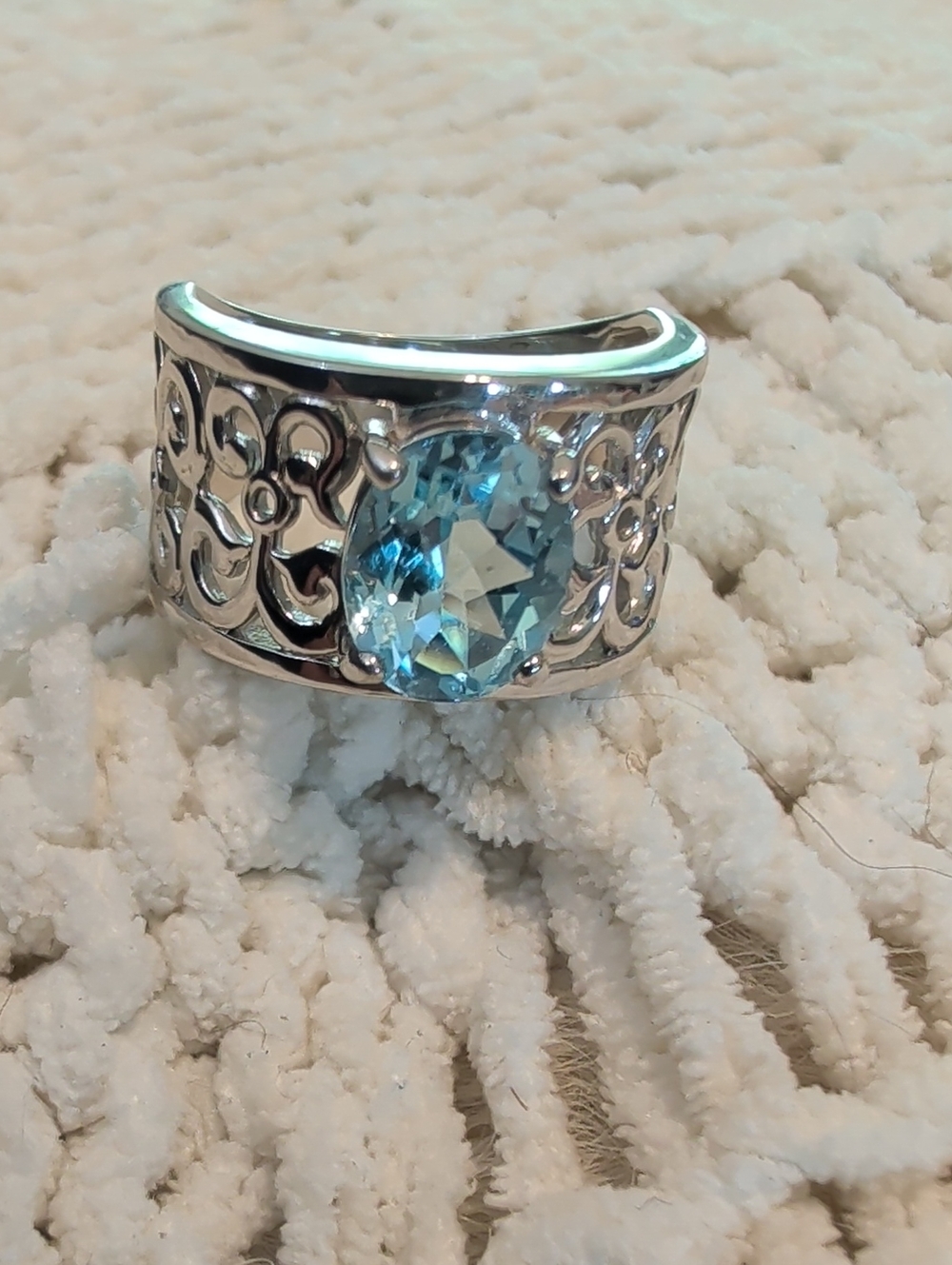 Sky Blue Topaz, 2.50 Carat, Oval Cut, 3/4" Sterling Silver Filigree Band, Sz 7.5